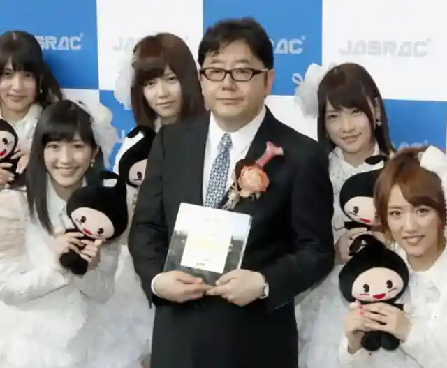 18. Yasushi Akimoto & Nami Takai