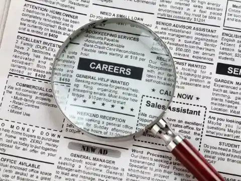 Flipping Through newspapers