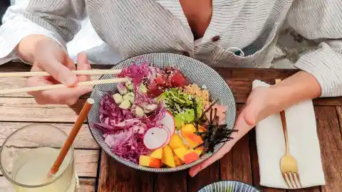 Inspecting Her Plate With Confusion 