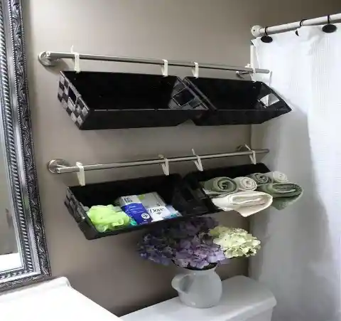 Hang Baskets On Towel Bars For Added Storage