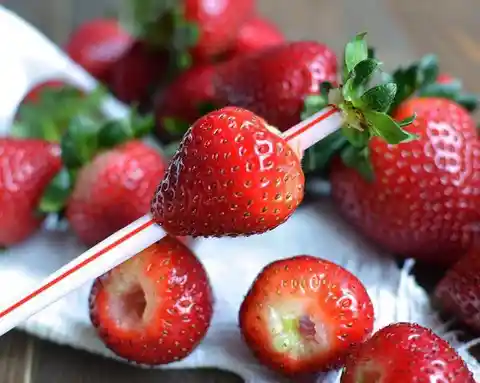 Incorporating The Straw Into The Strawberry