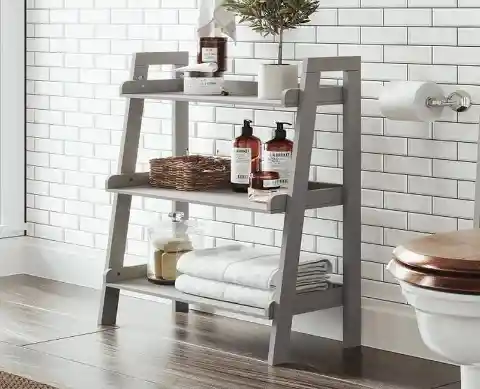 Opt For Stylish Ladder Style Shelving To Organize The Bathroom